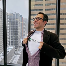 MK with superhero EHS Analytics shirt